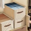 351c815e-8621-4f92-9d72-f8fb967c15c2.jpg 1pc Modern Oxford Fabric Storage Box with Upgraded Leather Handle media 35.99 x 18.01 x 16.99 cm