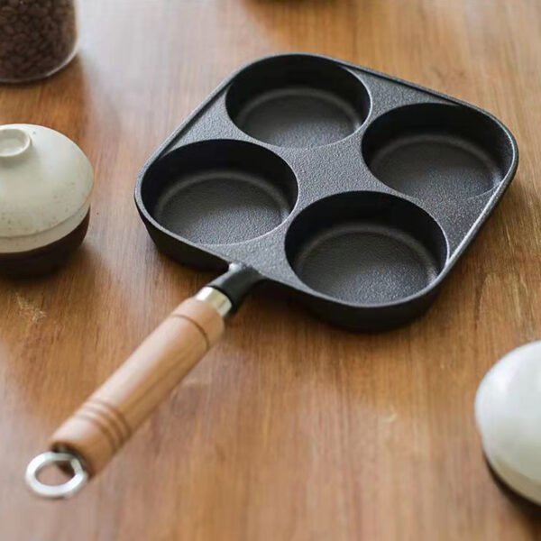 a39cb00d37e74ffebc23a6c6c02209e3-goods.jpeg 4-Cup Cast Iron Egg & Pancake Pan Non-Stick Omelette Skillet